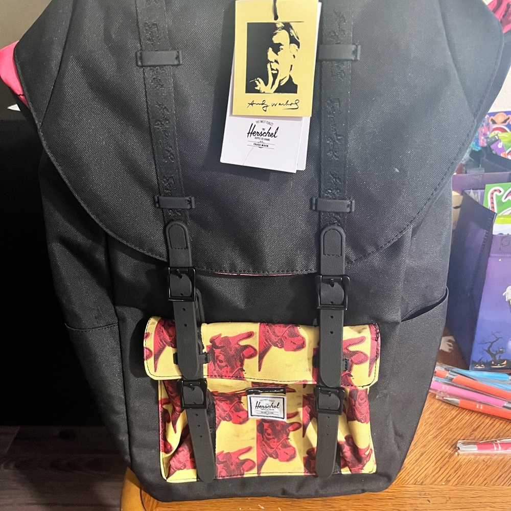 New Herschel Supply Company Black Backpack with Red and Yellow Accents